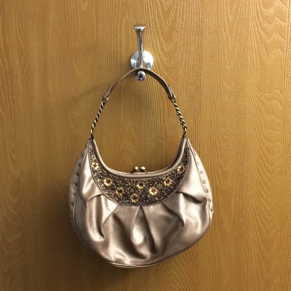 Brand new embroidered handbag.